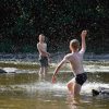 children playing in river